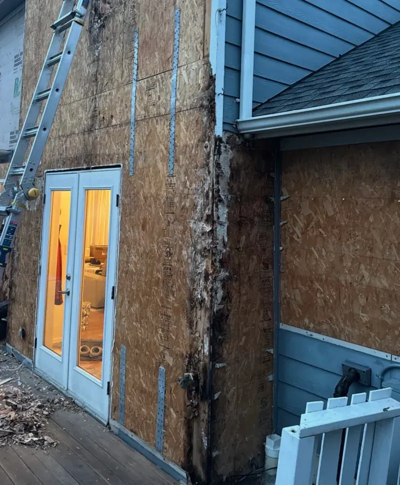 Before - Damaged siding