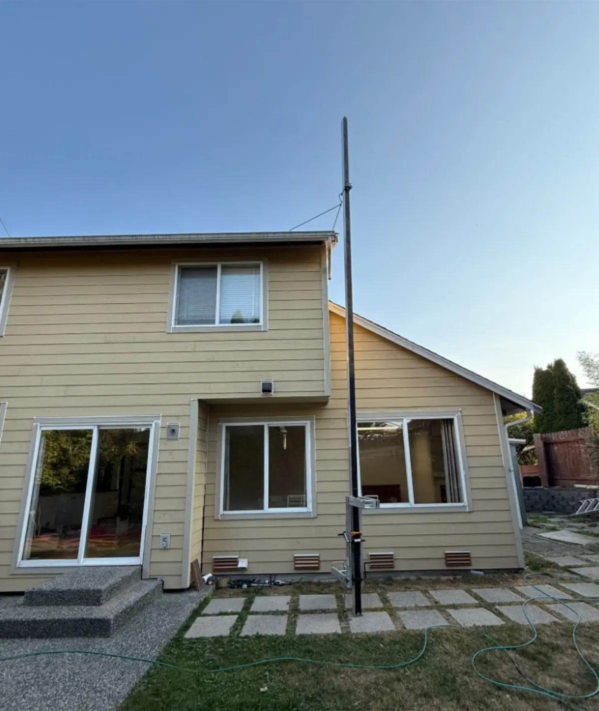 Front elevation of two-story home with siding