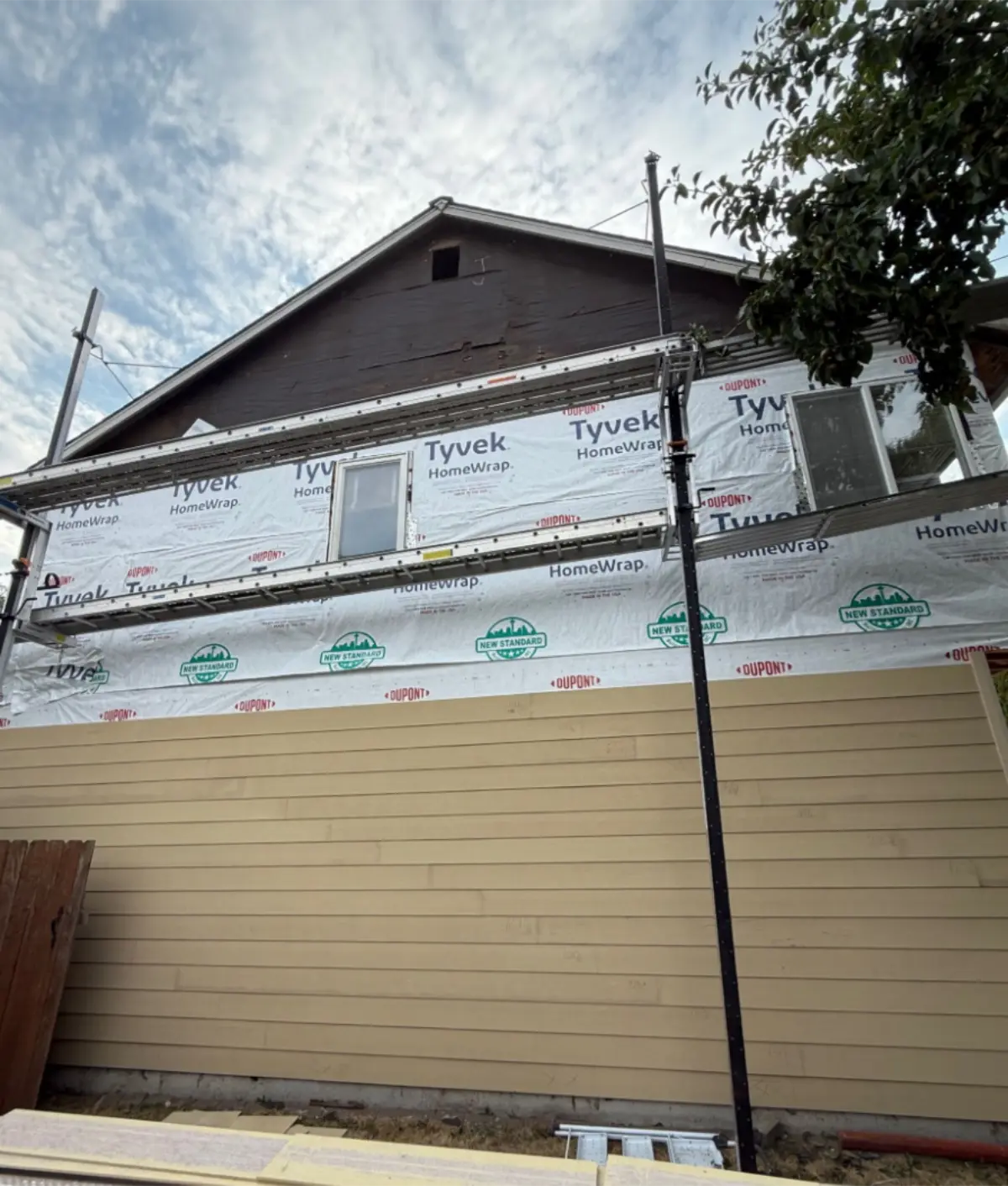 Scaffolding set up during siding tear-off on Lynnwood home