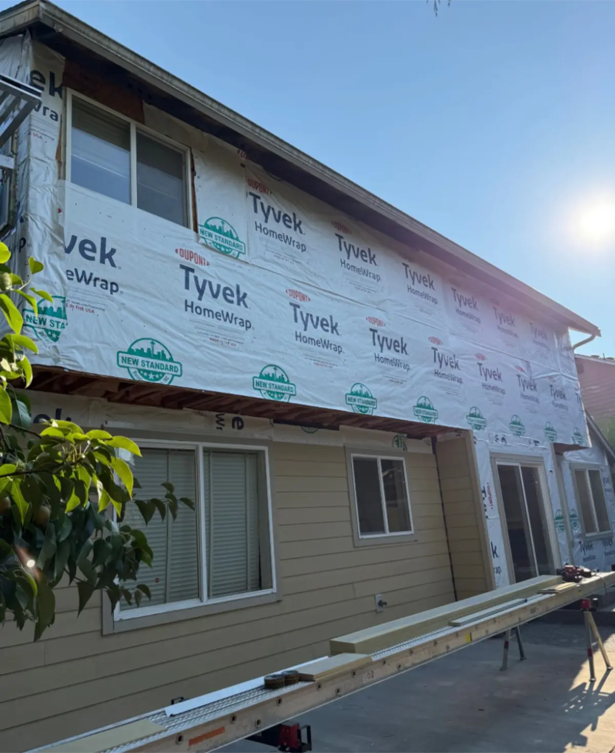 House wrap installed along narrow side yard wall