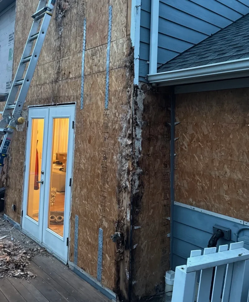 Before - Damaged siding